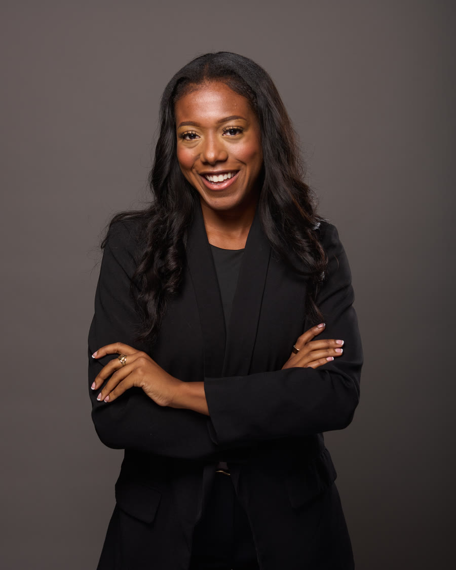 Studio portrait of Maya Ogunjobi in a black blazer