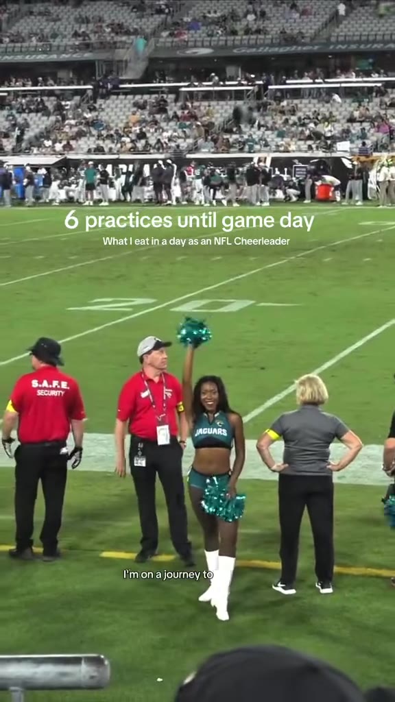 Maya on the field in her Jaguars uniform during a game-day practice week